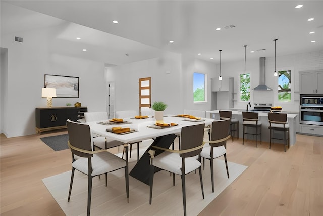 309 Alabaster, Horseshoe Bay, TX 78657 - dining space with light wood-type flooring, recessed lighting, and visible vents