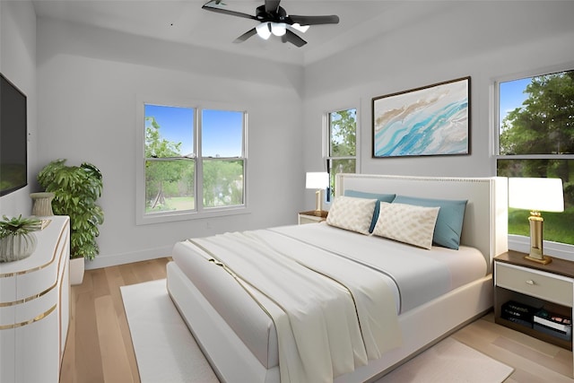 309 Alabaster, Horseshoe Bay, TX 78657 - bedroom featuring multiple windows and light wood-style floors