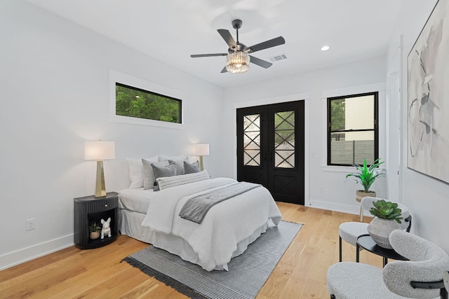 408 W 34th St, Austin, TX 78705 - bedroom with multiple windows, light wood-style flooring, a ceiling fan, and recessed lighting