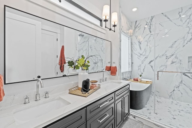 408 W 34th St, Austin, TX 78705 - bathroom with double vanity, a freestanding bath, a marble finish shower, and recessed lighting