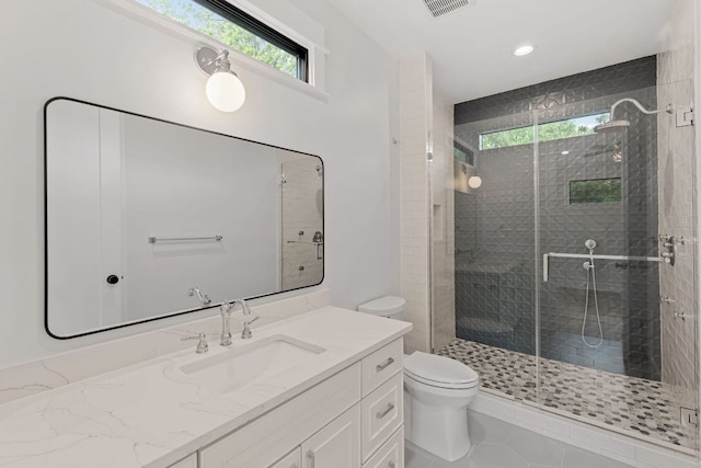 408 W 34th St, Austin, TX 78705 - full bath with a stall shower, vanity, tile patterned floors, and recessed lighting