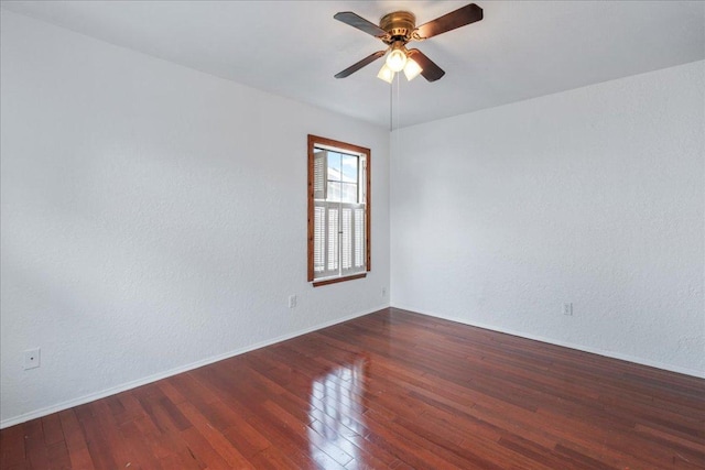 2215 Post Rd Unit 2029, Austin, TX 78704 - empty room with a ceiling fan, wood-type flooring, baseboards, and a textured wall