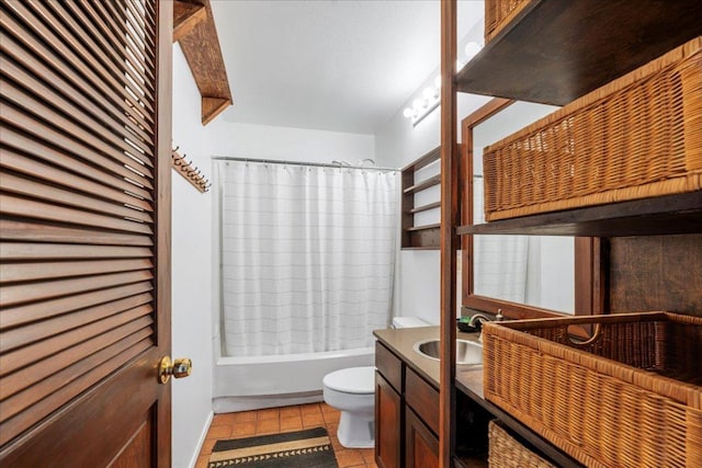 bathroom with vanity, tile patterned flooring, shower / bath combo, and toilet