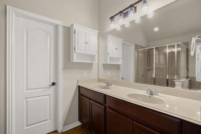 104 N Pasture Cv, Hutto, TX 78634 - full bath with a shower stall and double vanity