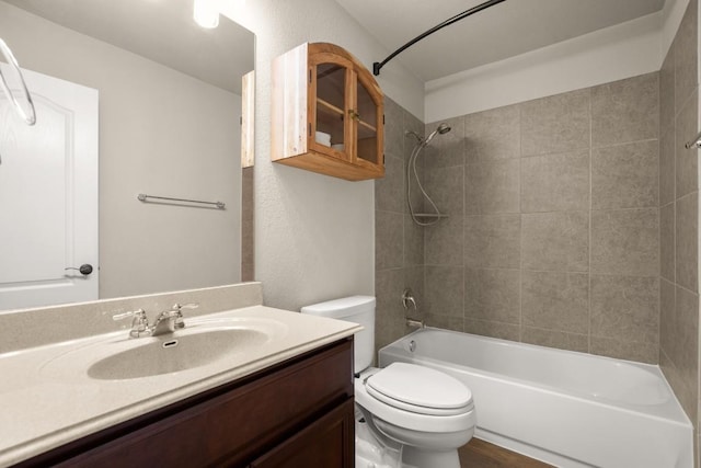 104 N Pasture Cv, Hutto, TX 78634 - bathroom with toilet, shower / bathtub combination, and vanity