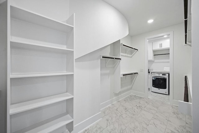 1220 Summer Moon Dr, Georgetown, TX 78628 - walk in closet with light marble finish floors