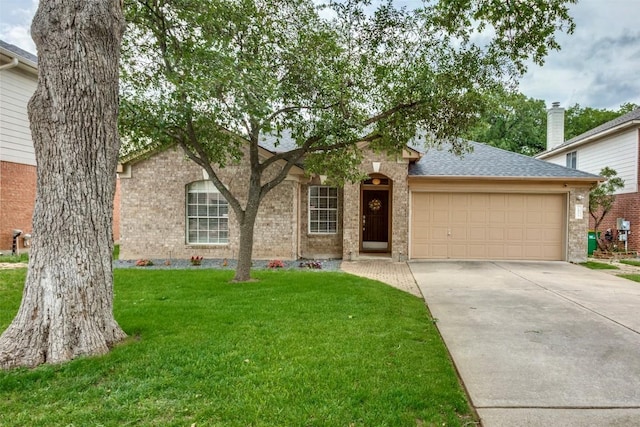view of front facade featuring an attached garage, concrete driveway, a front yard, and brick siding
