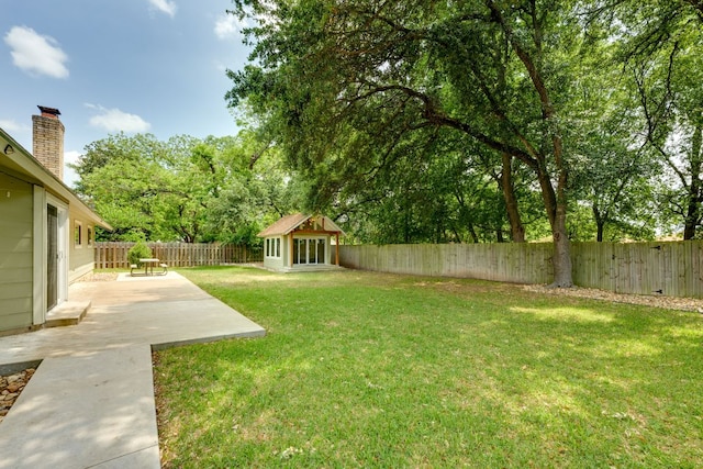 1307 S Meadows Dr, Austin, TX 78758 - view of yard with a patio area and an outbuilding