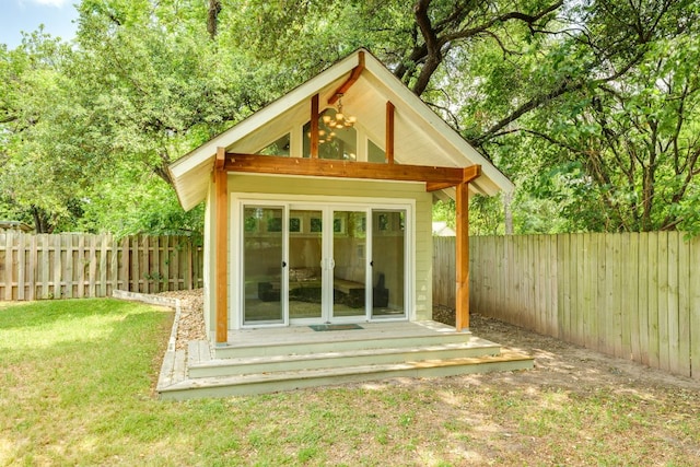 view of outbuilding with an outdoor structure and a fenced backyard