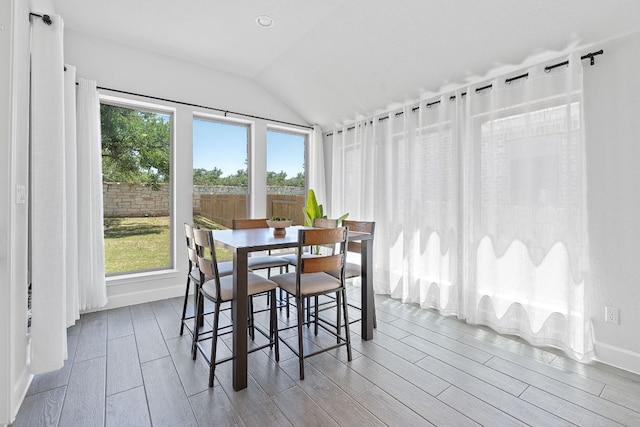 1504 Caylea Bluff Ln, Georgetown, TX 78628 - sunroom with wood tiled floors and vaulted ceiling