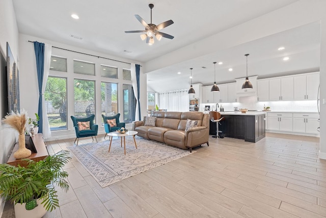 1504 Caylea Bluff Ln, Georgetown, TX 78628 - living area featuring ceiling fan, recessed lighting, and light wood-type flooring
