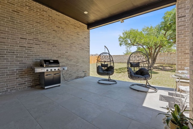 1504 Caylea Bluff Ln, Georgetown, TX 78628 - fenced backyard featuring grilling area and a patio area