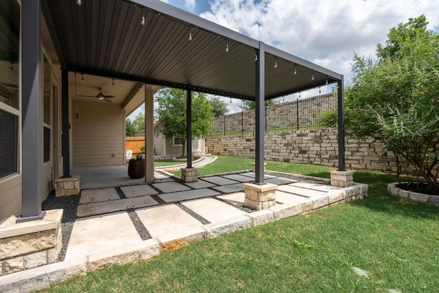 12509 Morelia Way, Austin, TX 78748 - view of patio / terrace with ceiling fan, an outbuilding, and a fenced backyard