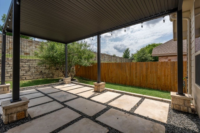 view of patio featuring a fenced backyard