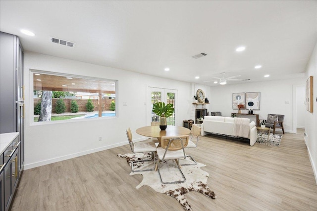 dining area featuring ceiling fan, light wood-type flooring, recessed lighting, and visible vents