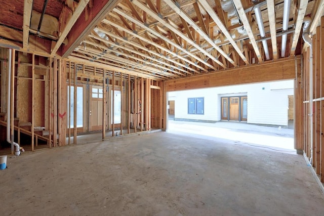 misc room with unfinished concrete floors