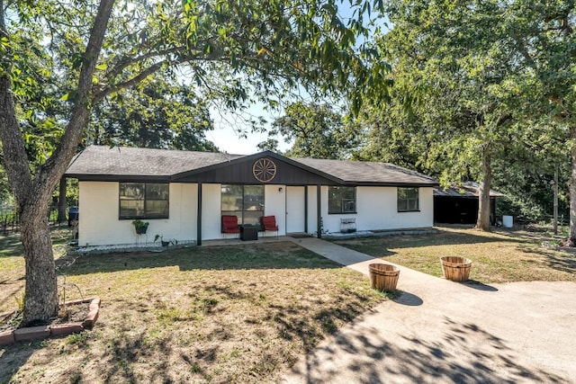 9623 County Road 347, Caldwell, TX 77836 - single story home featuring a shingled roof and a front lawn