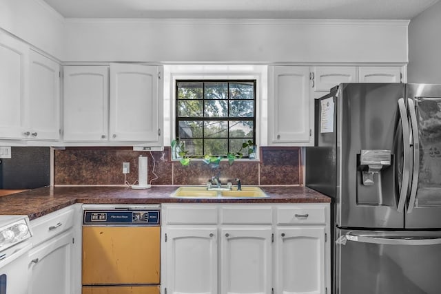 9623 County Road 347, Caldwell, TX 77836 - kitchen featuring white cabinets, white electric range oven, a sink, stainless steel fridge with ice dispenser, and dishwashing machine