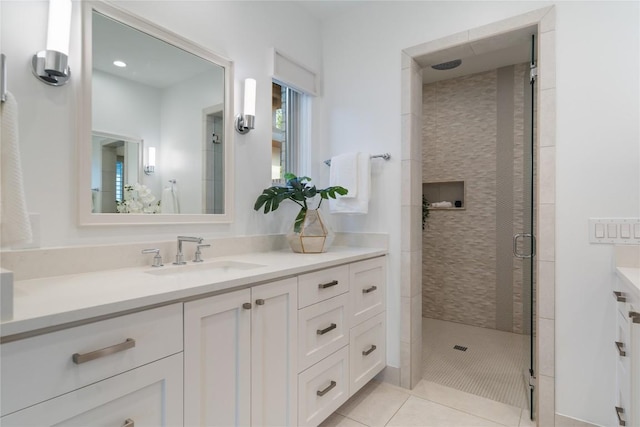 2902 Cedarview Dr, Austin, TX 78704 - bathroom with vanity, tile patterned floors, and a stall shower
