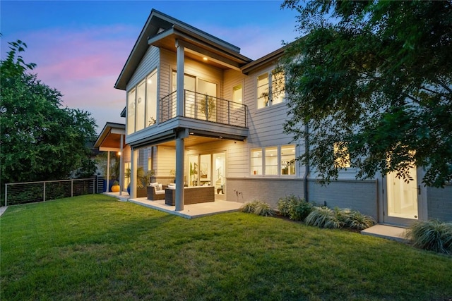 2902 Cedarview Dr, Austin, TX 78704 - rear view of property with a lawn, a patio area, fence, a balcony, and outdoor lounge area