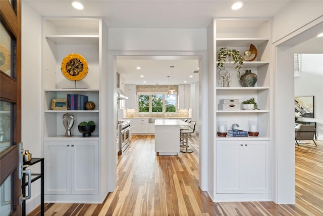 2902 Cedarview Dr, Austin, TX 78704 - hall featuring recessed lighting, built in features, and light wood-style floors
