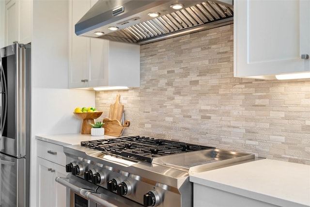 2902 Cedarview Dr, Austin, TX 78704 - kitchen with light countertops, backsplash, extractor fan, and stainless steel appliances