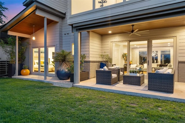 2902 Cedarview Dr, Austin, TX 78704 - patio terrace at dusk with french doors, an outdoor hangout area, a lawn, a ceiling fan, and a patio
