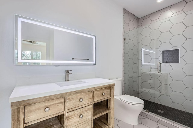 full bathroom with vanity, toilet, recessed lighting, tile patterned floors, and a shower stall