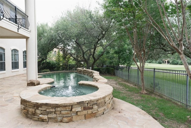 view of swimming pool featuring fence and a fenced in pool