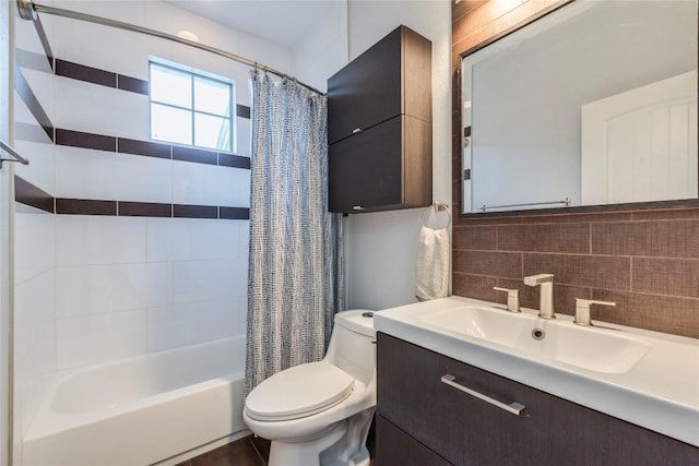 1606 Morgan Ln Unit B, Austin, TX 78704 - bathroom with toilet, shower / bath combo with shower curtain, vanity, and tasteful backsplash