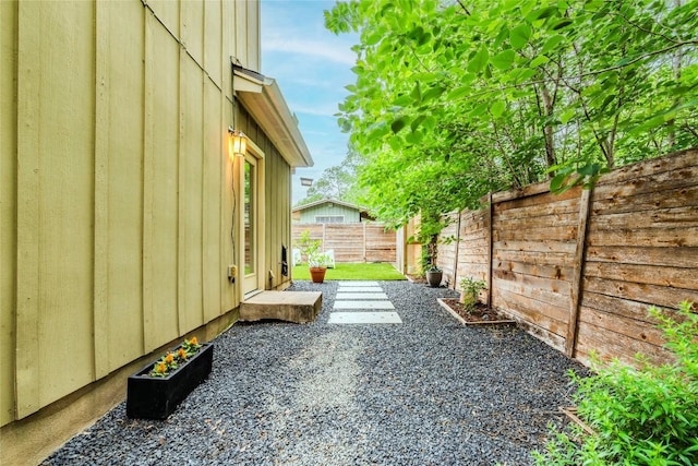 view of yard featuring a fenced backyard