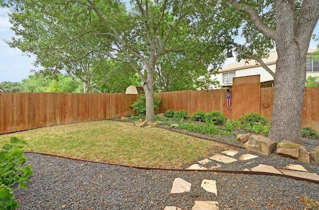 view of yard featuring a fenced backyard