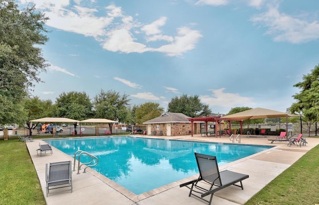 community pool with a pergola, a gazebo, fence, and a patio area