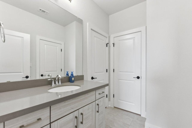 4617 Port Genova Ct, Leander, TX 78641 - bathroom with vanity and tile patterned flooring