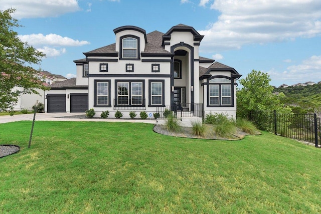 4617 Port Genova Ct, Leander, TX 78641 - french country inspired facade featuring concrete driveway, a garage, stucco siding, and roof with shingles
