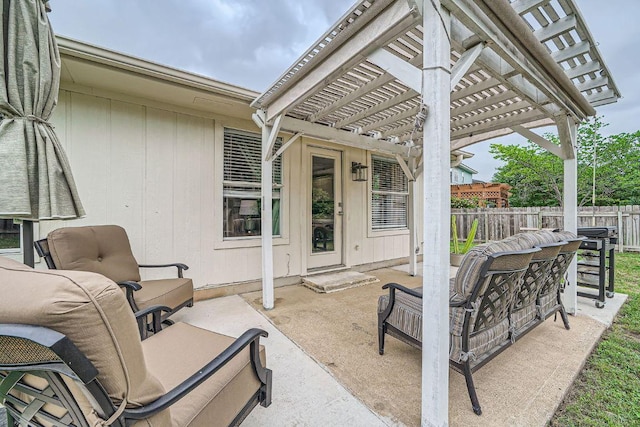 view of patio / terrace with fence and a pergola