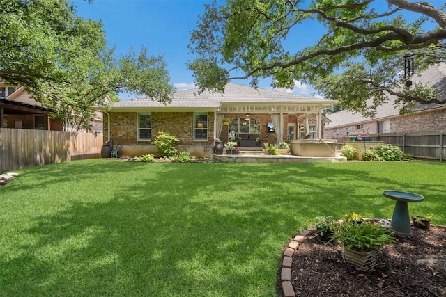 1312 Becca Teal Pl, Round Rock, TX 78681 - back of property featuring a hot tub