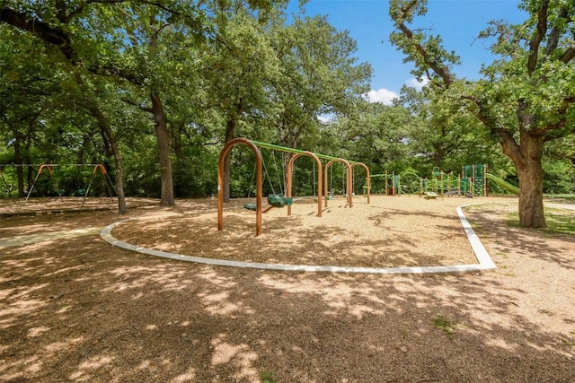 1312 Becca Teal Pl, Round Rock, TX 78681 - community play area with view of wooded area