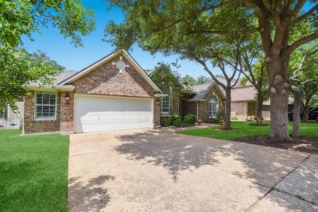 1312 Becca Teal Pl, Round Rock, TX 78681 - view of front facade with an attached garage, driveway, a front lawn, and brick siding