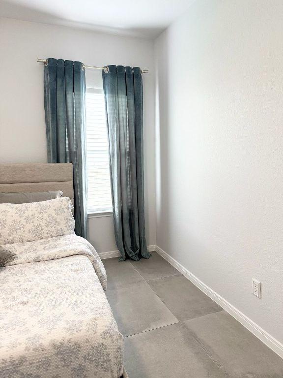 bedroom with baseboards