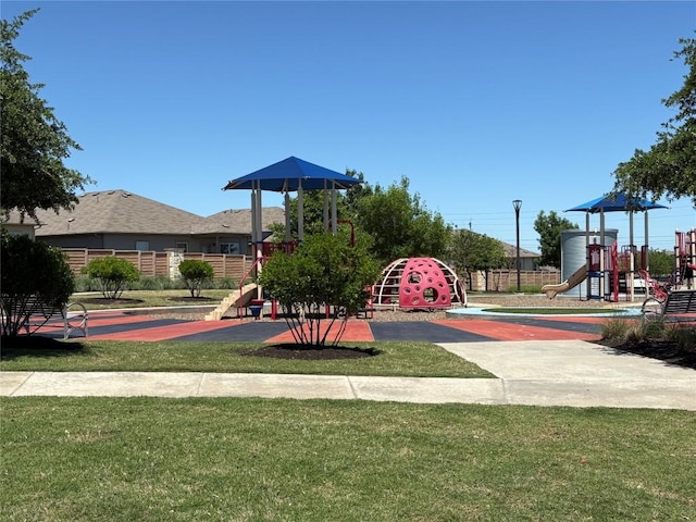 community play area with a yard