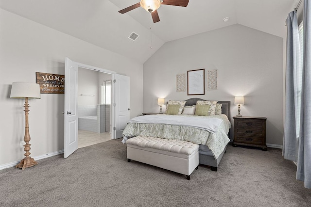 bedroom featuring carpet flooring, ceiling fan, ensuite bathroom, lofted ceiling, and visible vents