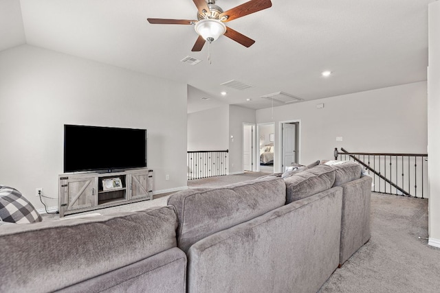 living area with visible vents, light carpet, attic access, ceiling fan, and recessed lighting
