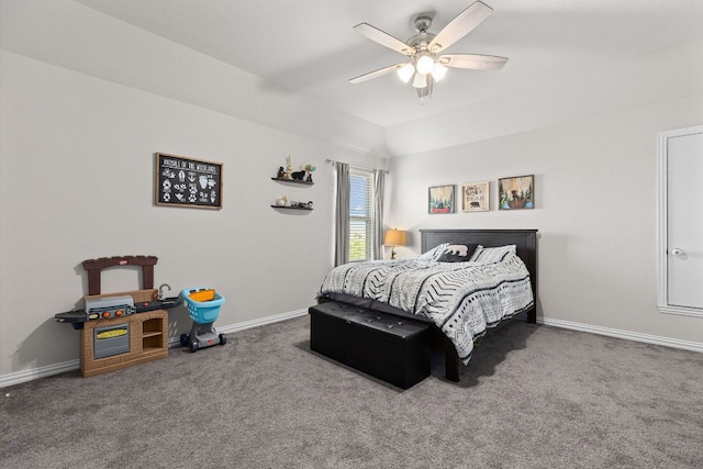 carpeted bedroom with baseboards and a ceiling fan