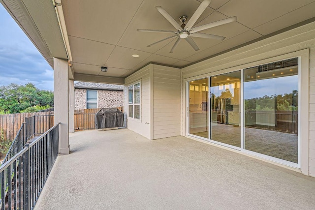 6914 Halesboro Dr, Austin, TX 78736 - view of patio with fence, ceiling fan, and area for grilling
