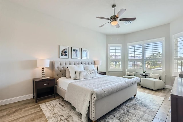 6914 Halesboro Dr, Austin, TX 78736 - bedroom with baseboards, ceiling fan, light wood-style flooring, and visible vents