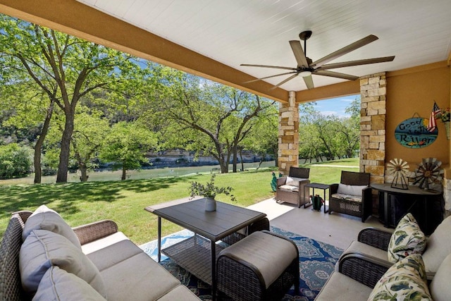 view of patio / terrace with ceiling fan and an outdoor hangout area