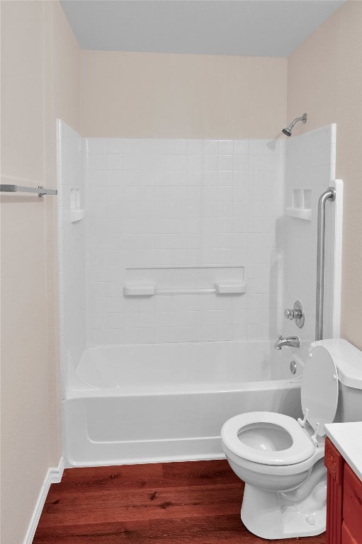 full bathroom with vanity, shower / tub combination, wood finished floors, and toilet