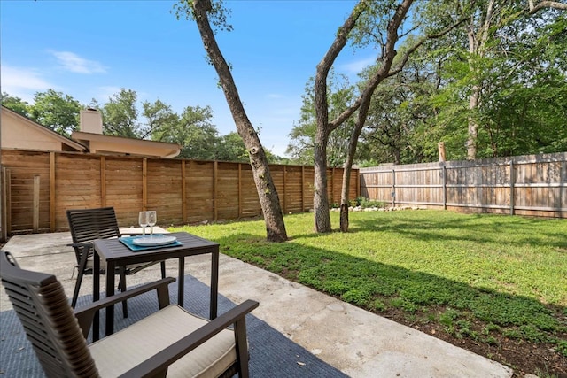 view of patio featuring a fenced backyard