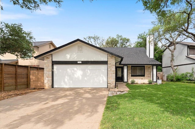 ranch-style house featuring roof with shingles, a front yard, a garage, fence, and concrete driveway